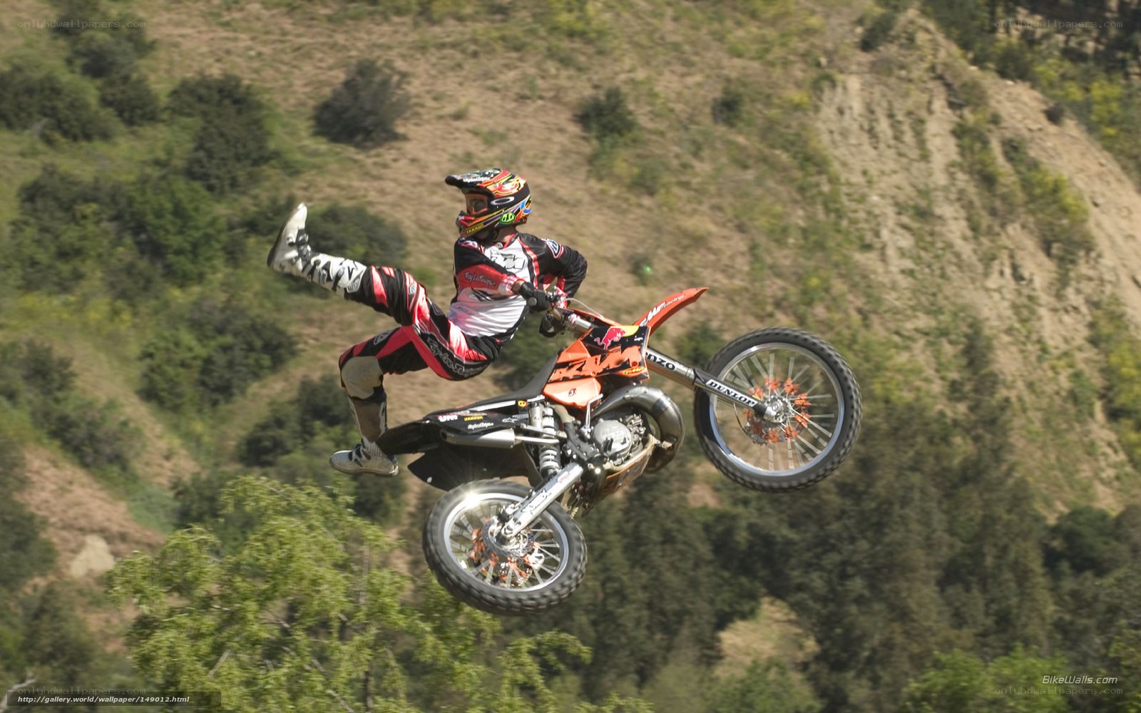 Motocross rider in mid-air jump