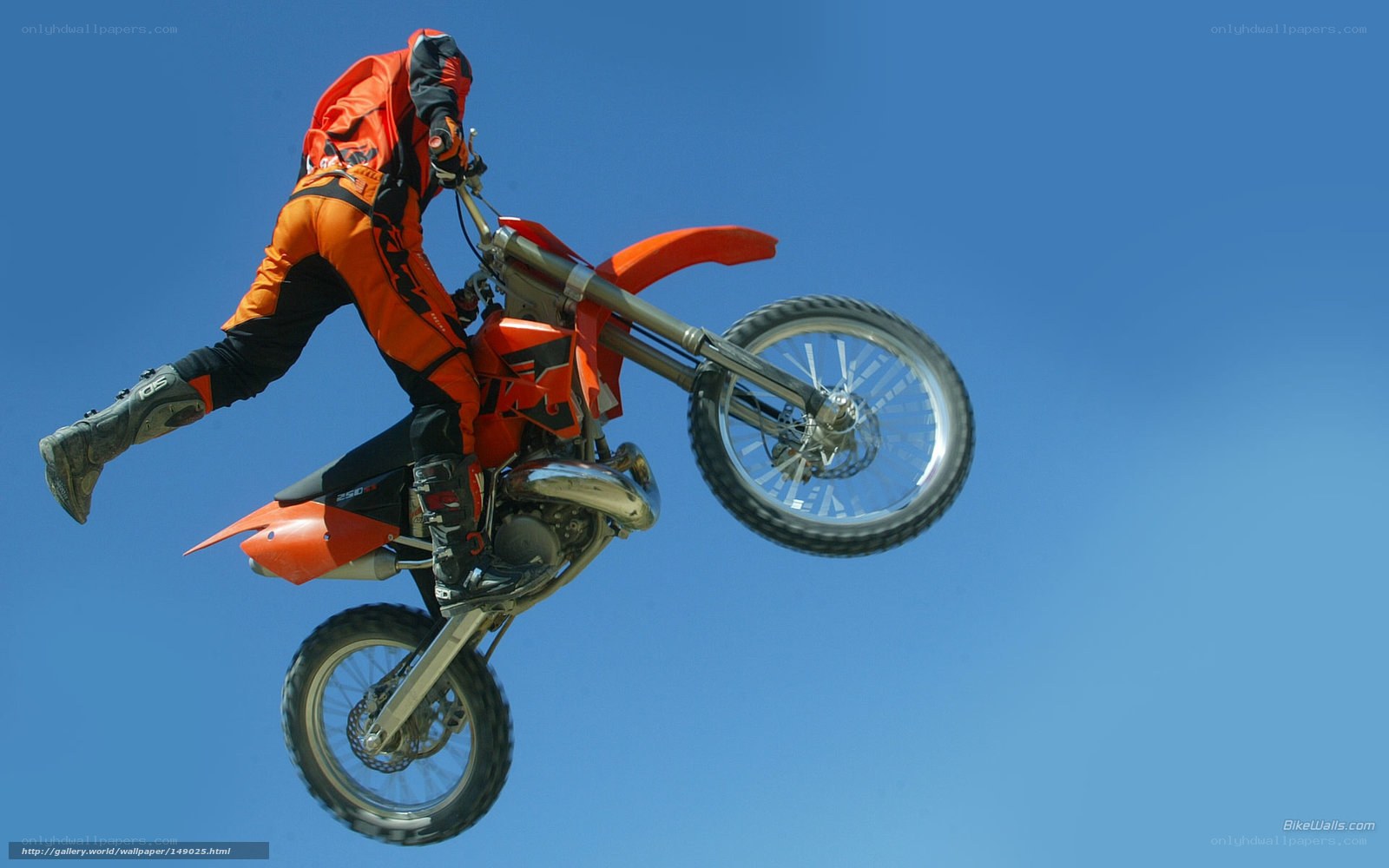 Motocross rider in mid-air jump