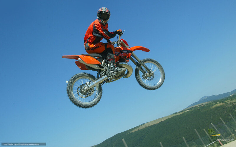 Motocross rider in mid-air jump