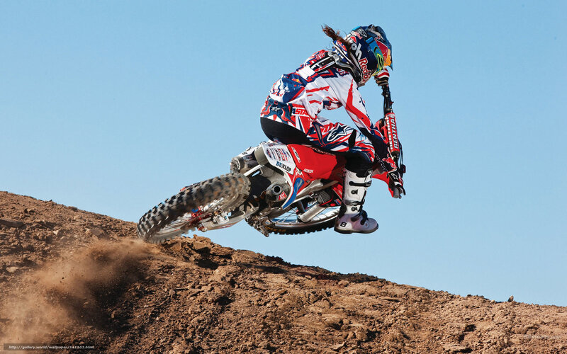 Motocross rider in mid-air jump