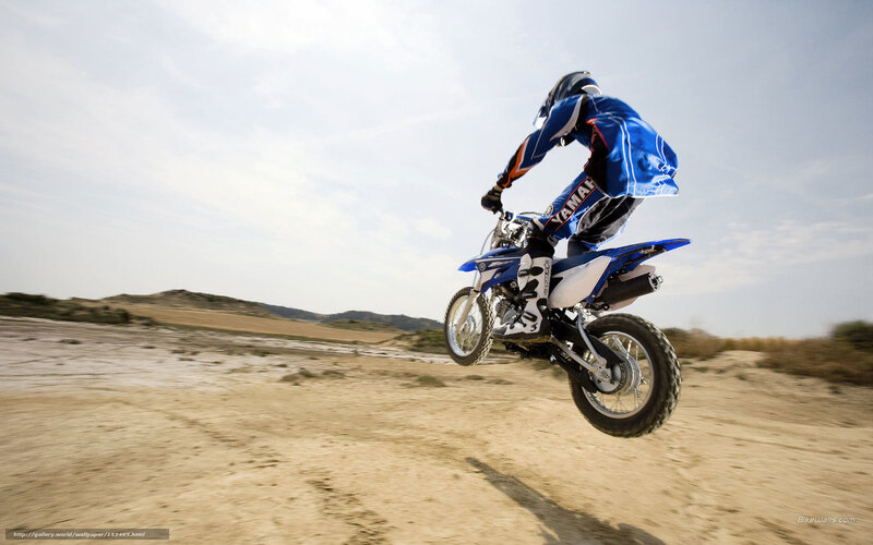 Motocross rider in mid-air jump