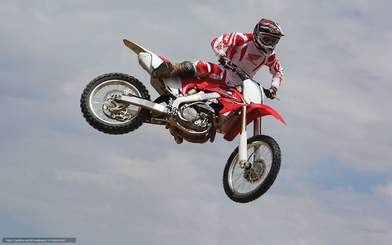 Motocross rider in mid-air jump