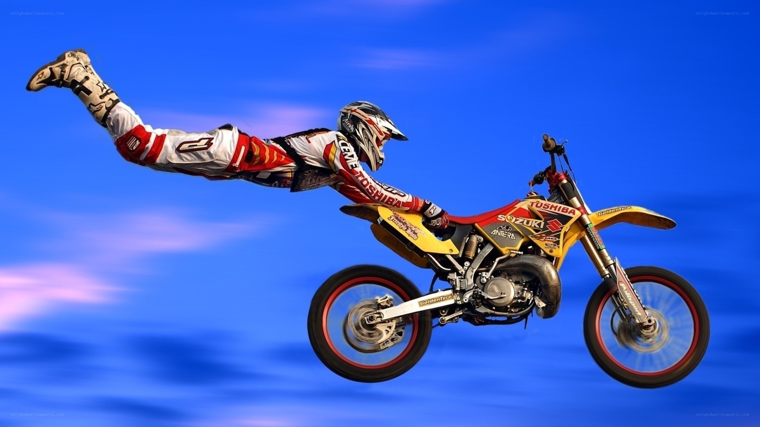 Motocross rider in mid-air jump