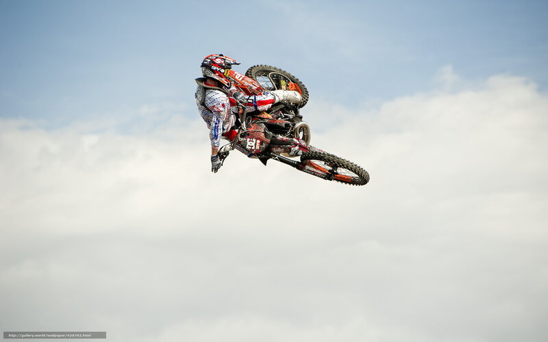 Motocross rider in mid-air jump