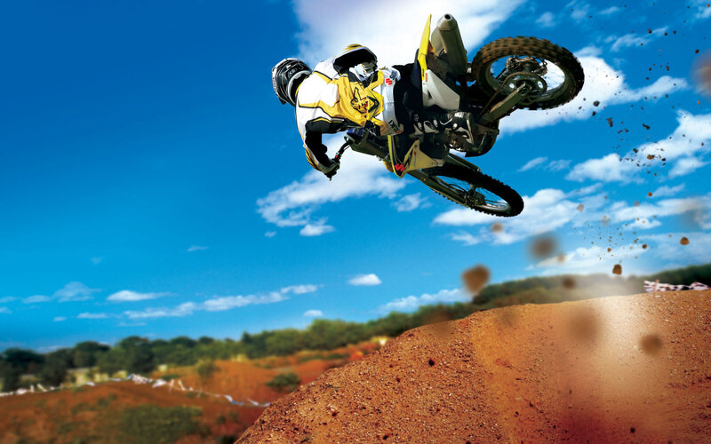 Motocross rider in mid-air jump