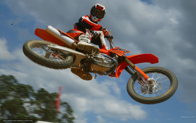 Motocross Rider in Mid-air — Orange, Dynamic, Afternoon, Photograph