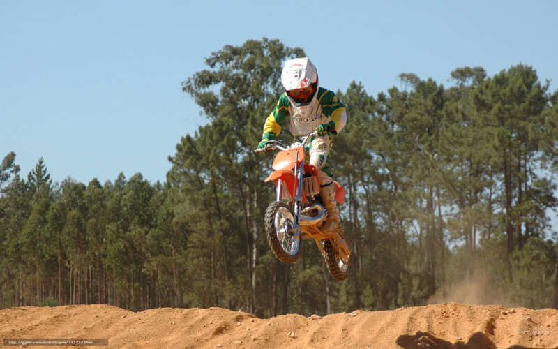 Motocross Rider in Mid-air — Orange