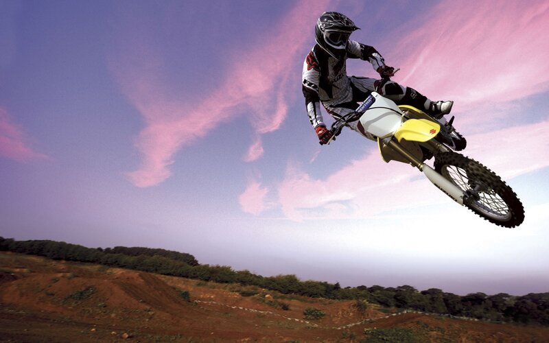 Motocross Rider in Mid-air — Purple