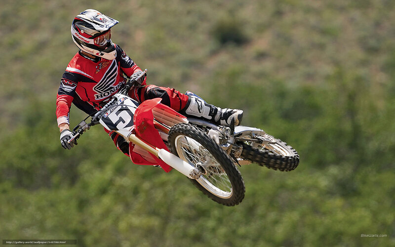 Motocross Rider in Mid-air — Red, Dynamic, Afternoon, Photograph, Motorcycle, Helmet, Racing Gear