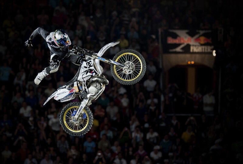 Motocross rider in mid-air stunt