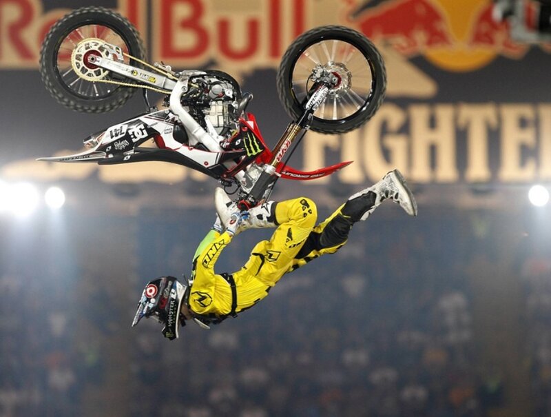 Motocross rider in mid-air stunt