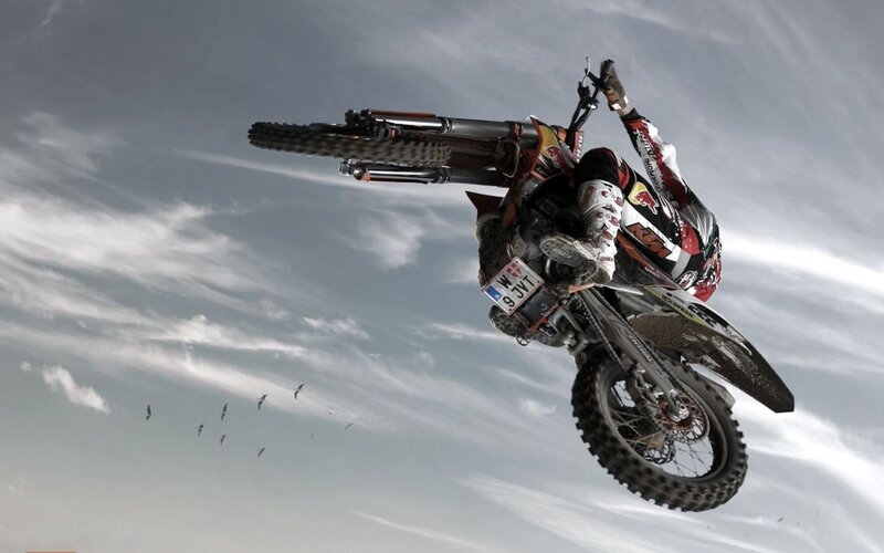 Motocross rider in mid-air stunt