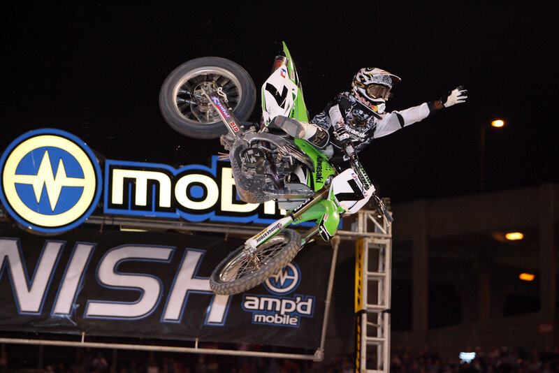 Motocross rider in mid-air stunt