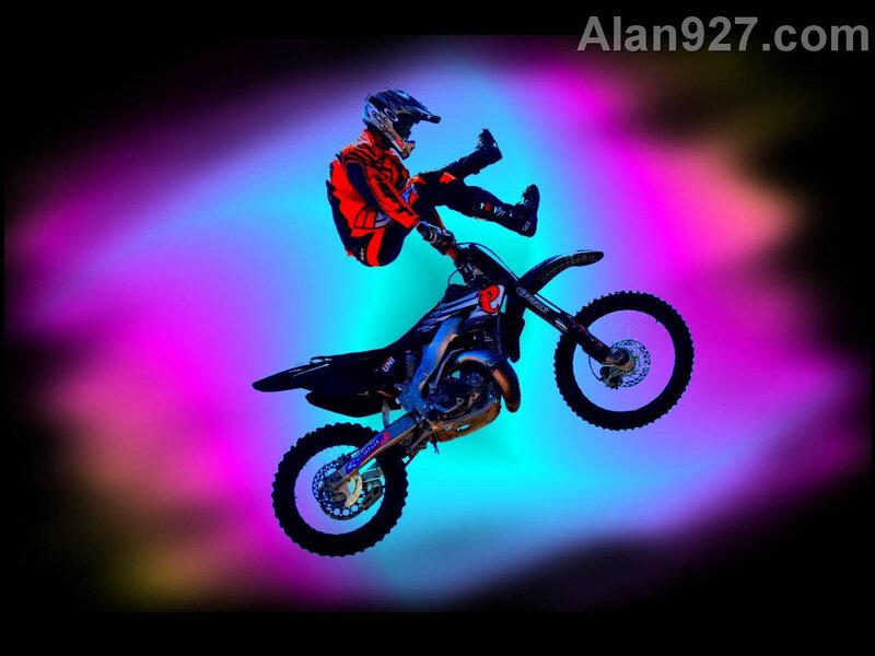 Motocross rider in mid-air stunt