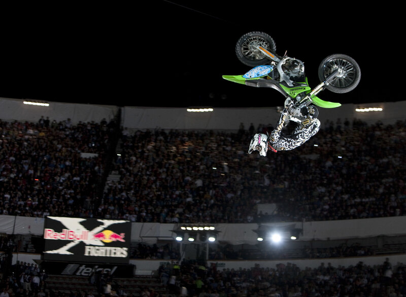 Motocross rider in mid-air stunt