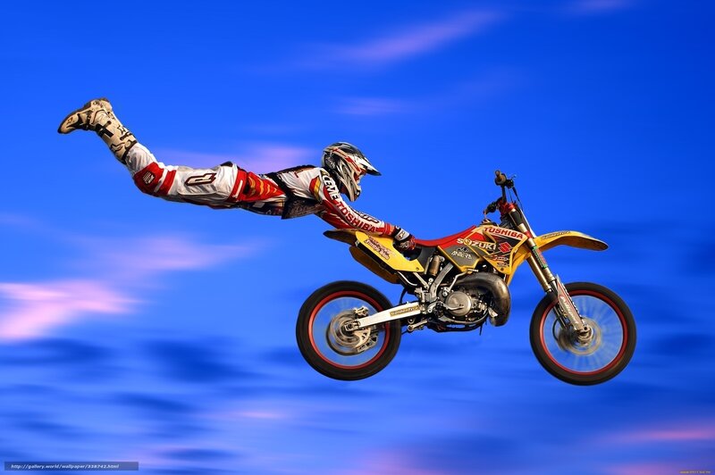 Motocross rider in mid-air stunt