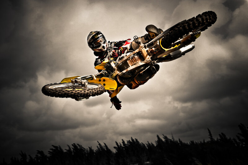 Motocross rider in mid-air stunt