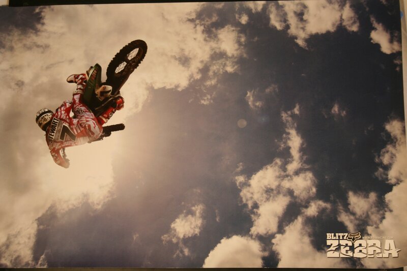 Motocross rider in mid-air stunt