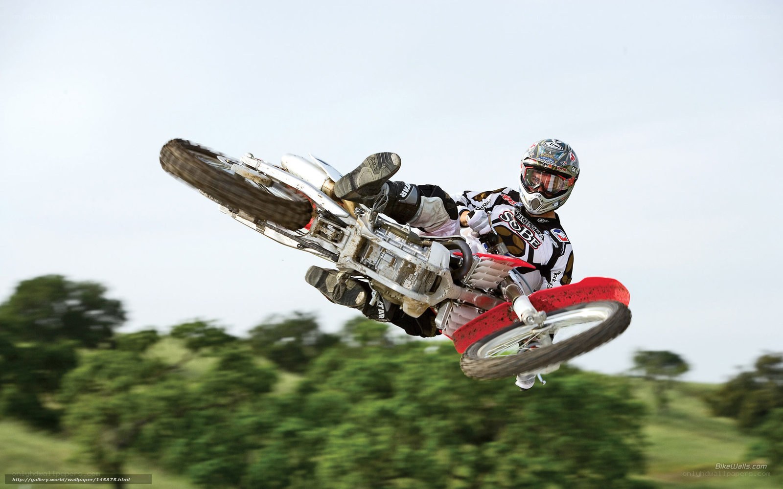 Motocross rider in mid-air stunt