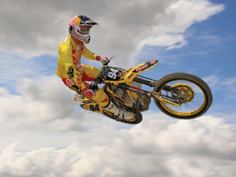 Motocross Rider in Mid-air — Yellow
