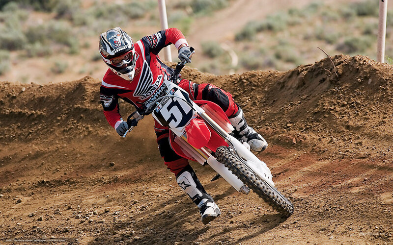 Motocross Rider on Dirt Bike — Red, Action