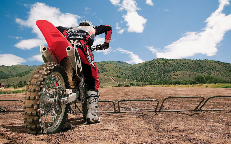 Motocross Rider on Dirt Bike — Red, Outdoor