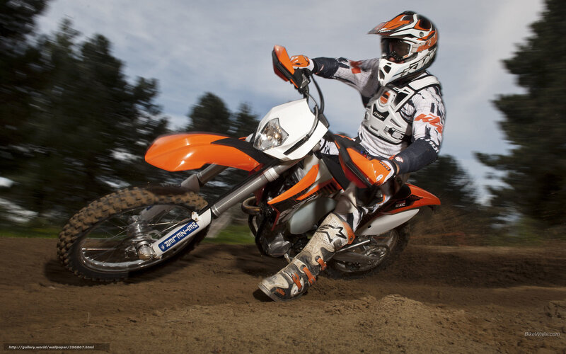 Motocross rider on dirt track