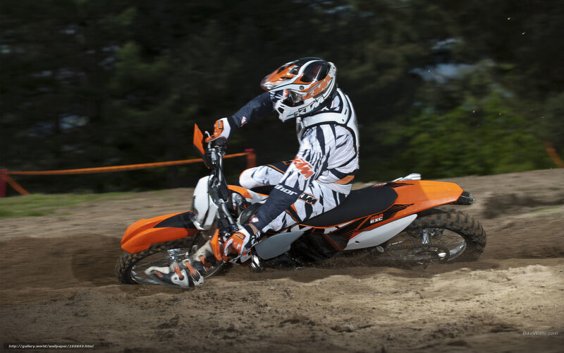 Motocross rider on dirt track