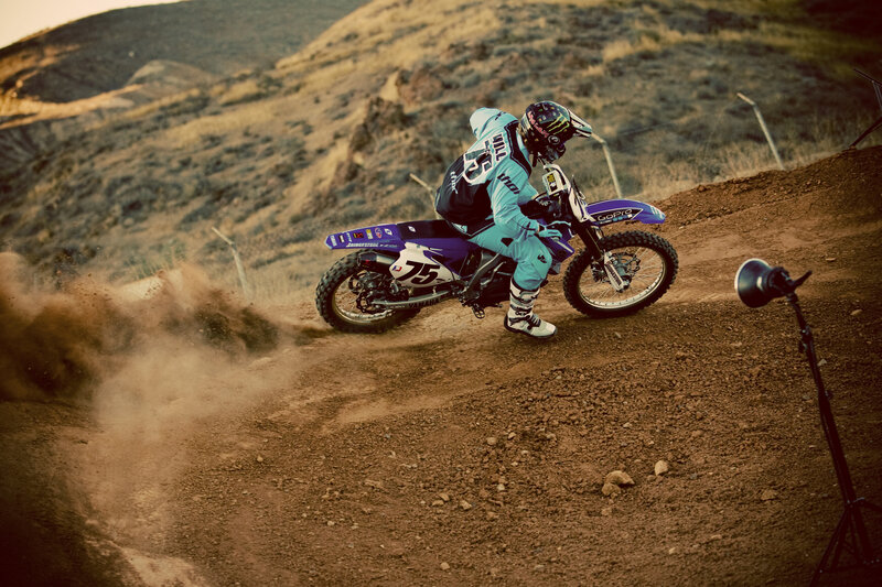 Motocross rider on dirt track