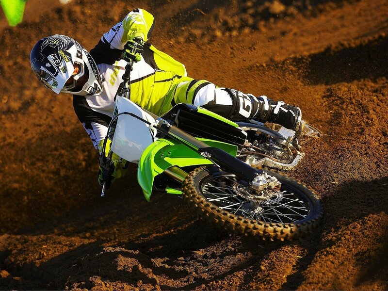 Motocross rider on dirt track