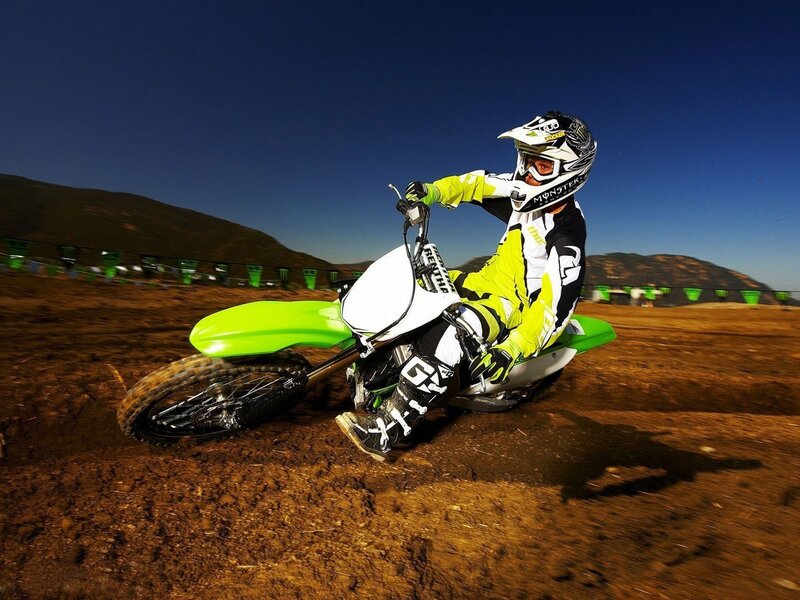 Motocross rider on dirt track