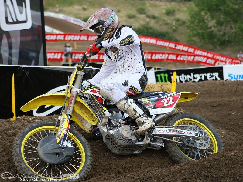 Motocross rider on dirt track