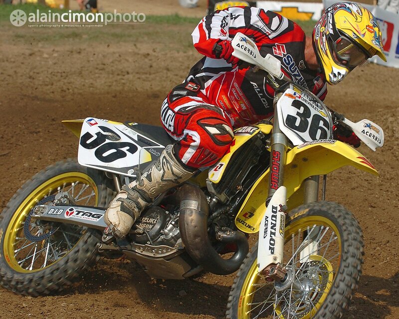 Motocross rider on dirt track