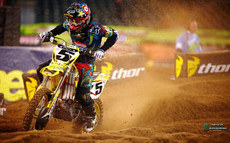 Motocross rider on dirt track