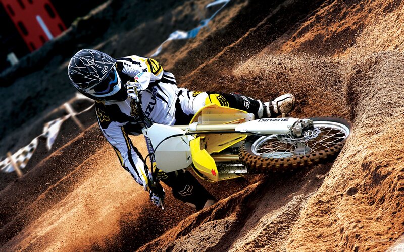 Motocross rider on dirt track