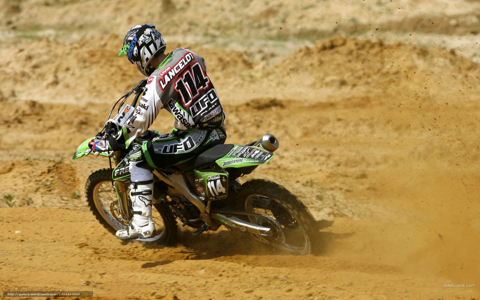 Motocross rider on dirt track