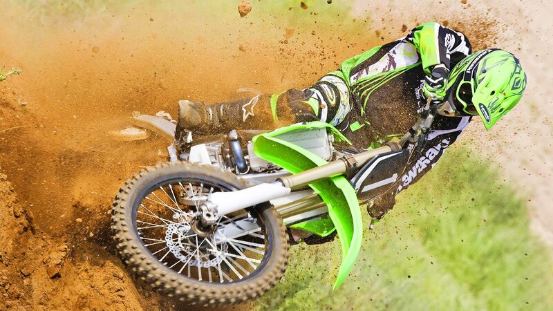 Motocross rider on dirt track