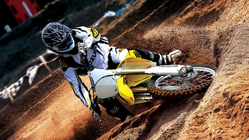 Motocross rider on dirt track