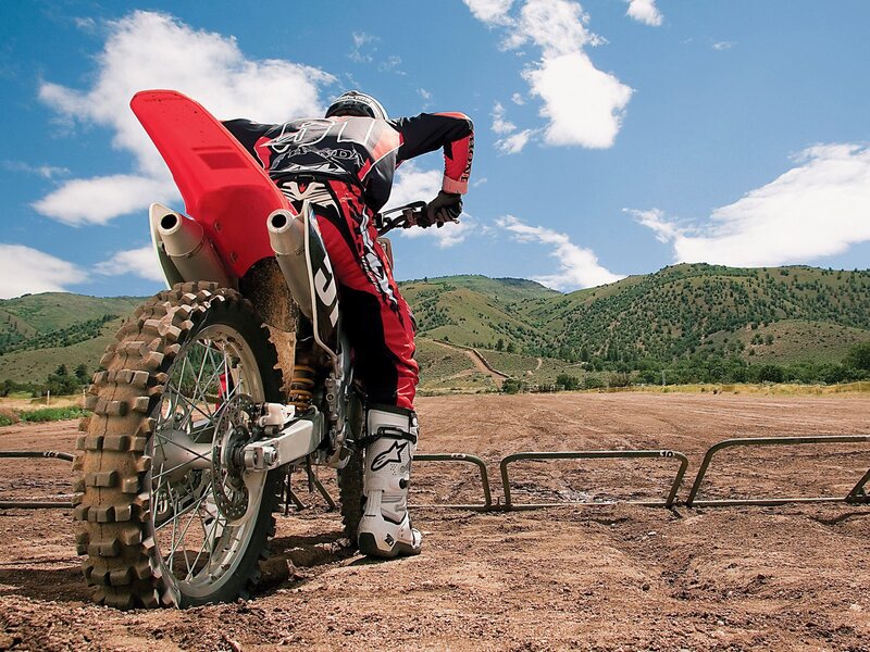 Motocross rider on dirt track