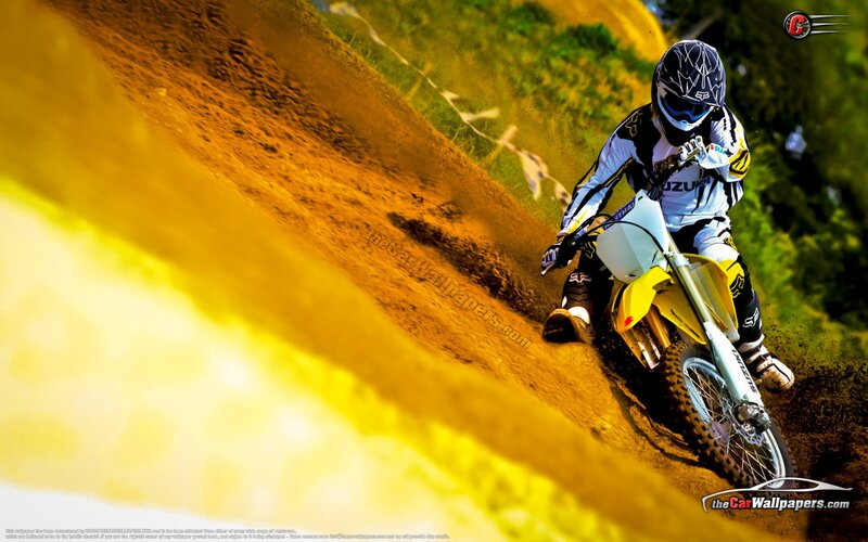 Motocross rider on dirt track