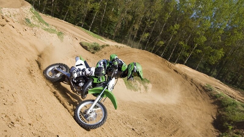 Motocross rider on dirt track