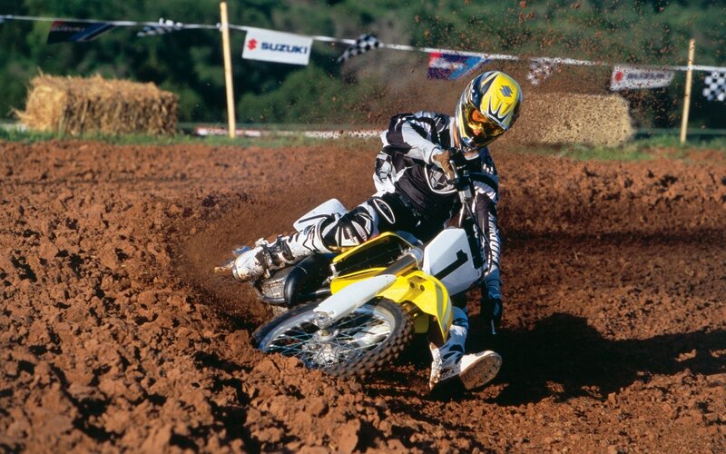 Motocross rider on dirt track