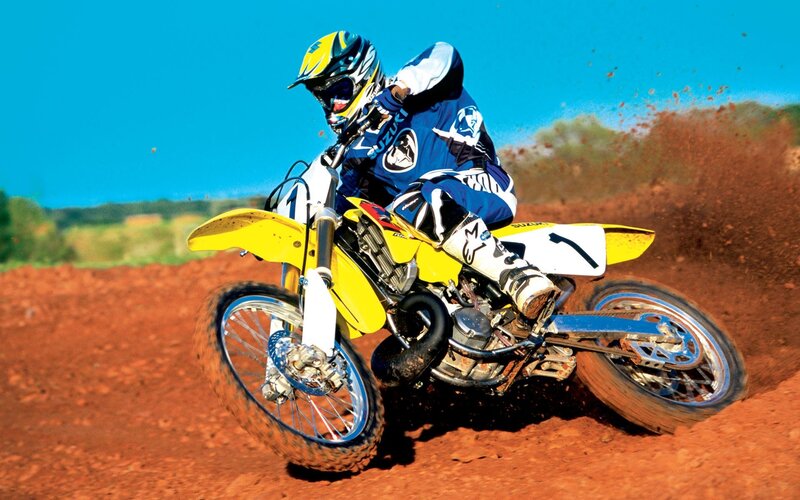 Motocross rider on dirt track