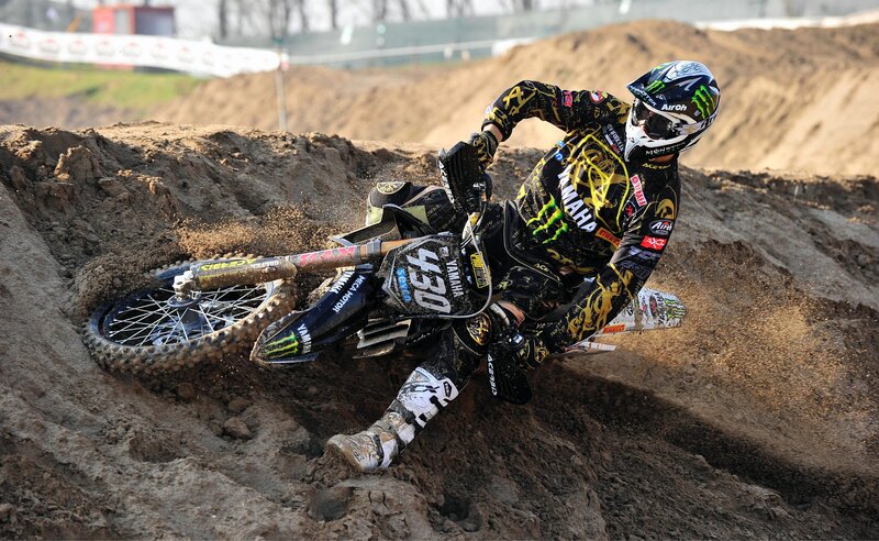 Motocross rider on dirt track