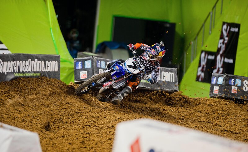 Motocross rider on dirt track