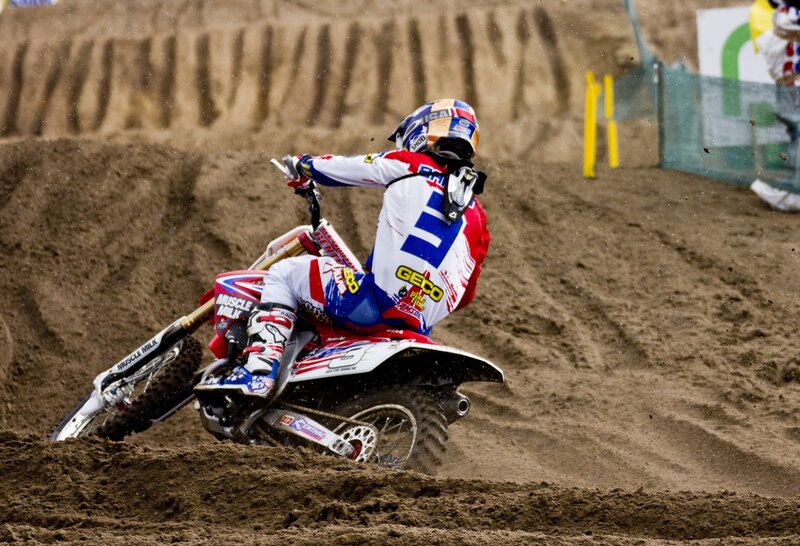 Motocross rider on dirt track