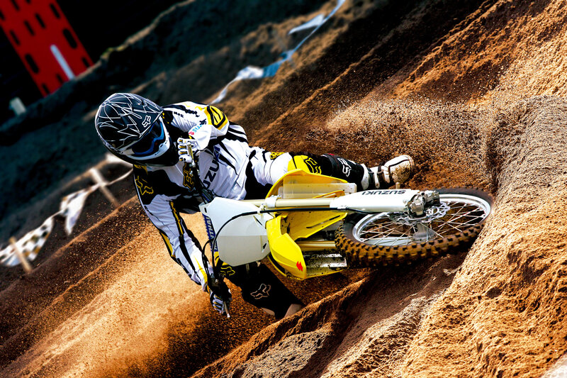 Motocross rider on dirt track