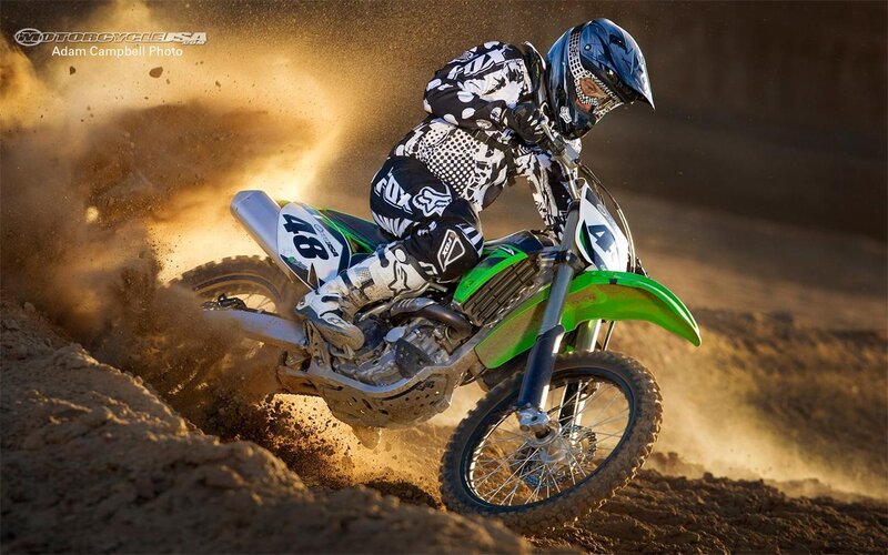 Motocross rider on dirt track
