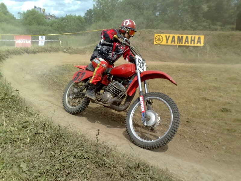 Motocross rider on dirt track