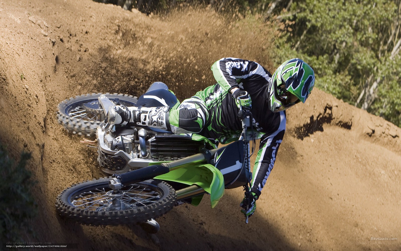 Motocross rider on dirt track